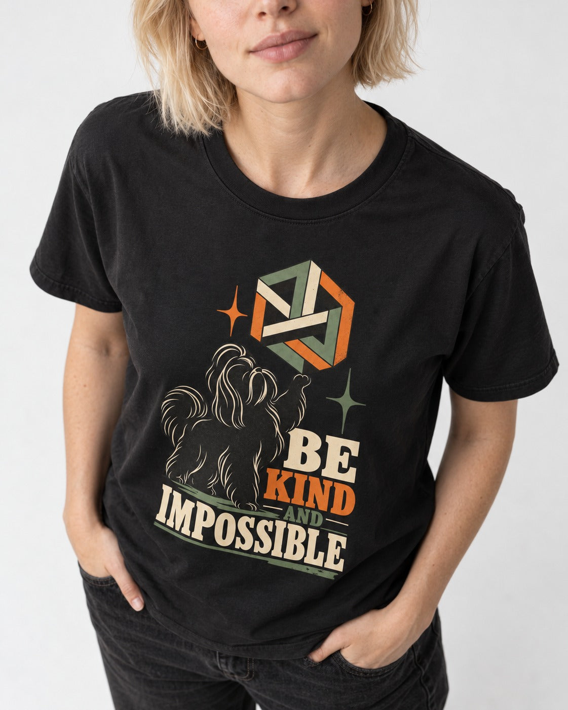 Shih Tzu Be Kind and Impossible Geometric Cube Graphic T-Shirt in Black, worn by a model, front view
