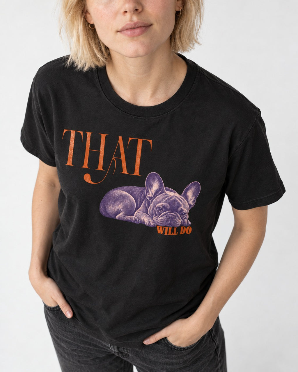 Frenchie That Will Do Resting Graphic T-Shirt in Black, worn by a model, front view