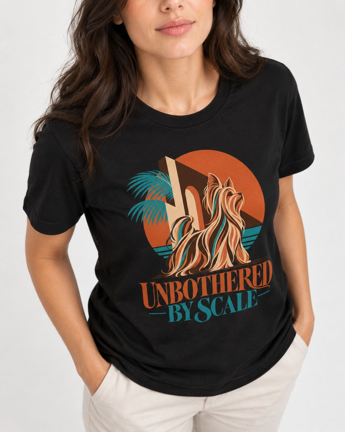 Yorkshire Terrier Unbothered by Scale Tropical Architecture Graphic T-Shirt in Black, worn by a model, front view