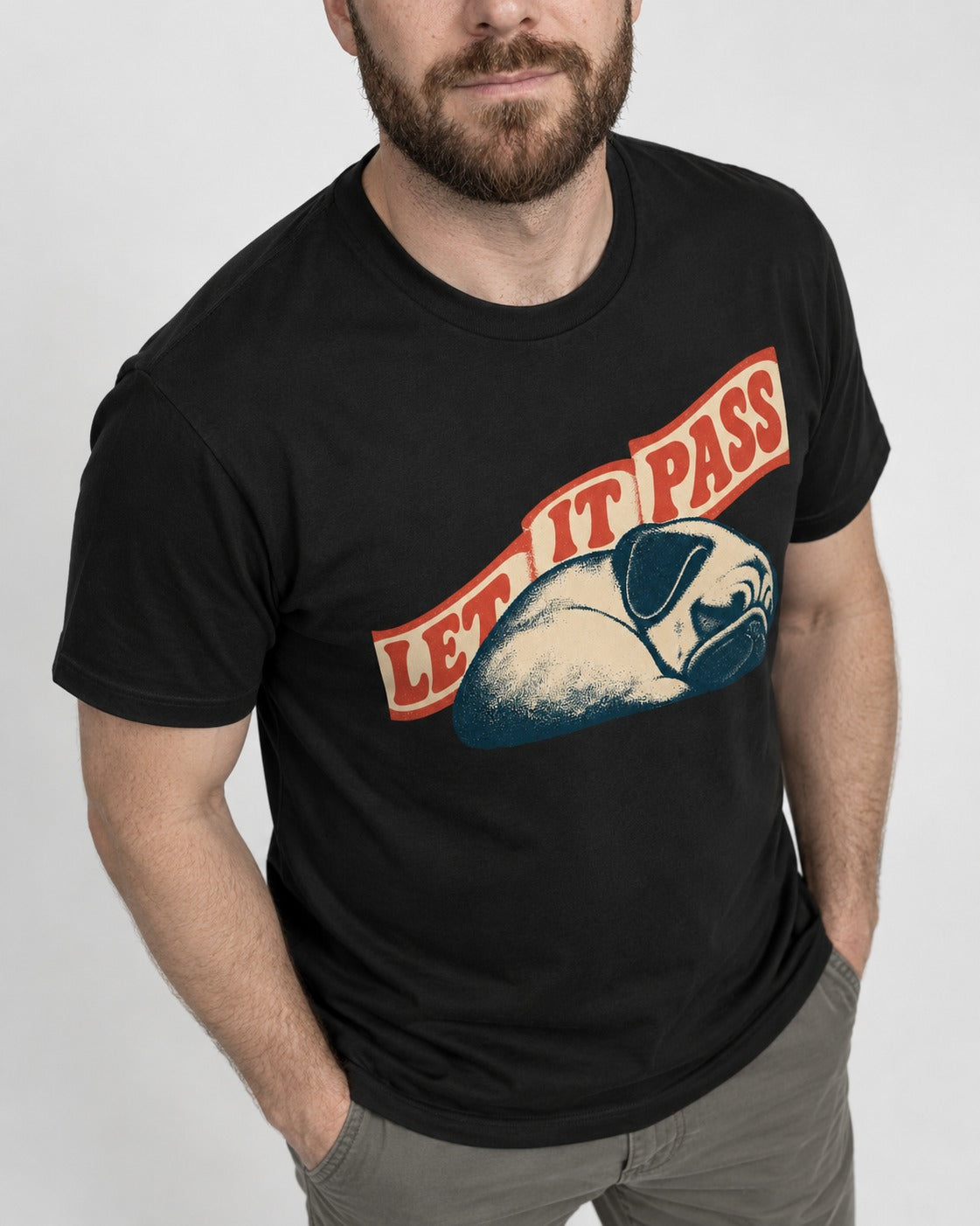 Pug Let It Pass Sleeping Banner Graphic T-Shirt in Black, worn by a model, front view