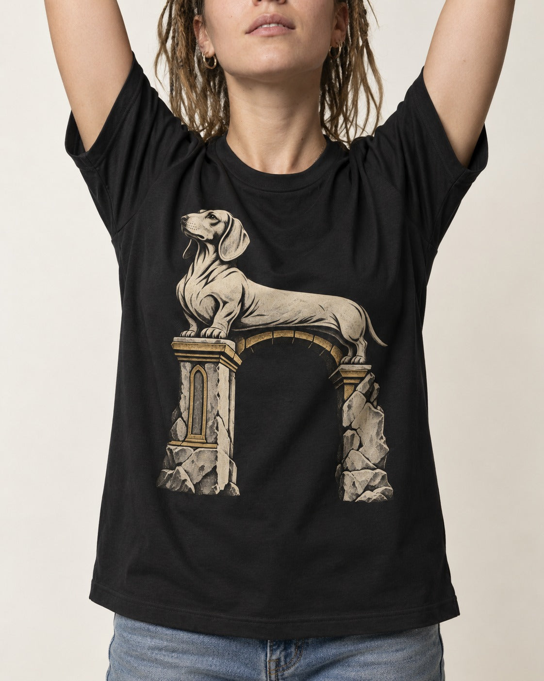 Dachshund Ruined Stone Arch Monument Graphic T-Shirt in Black, worn by a model, front view