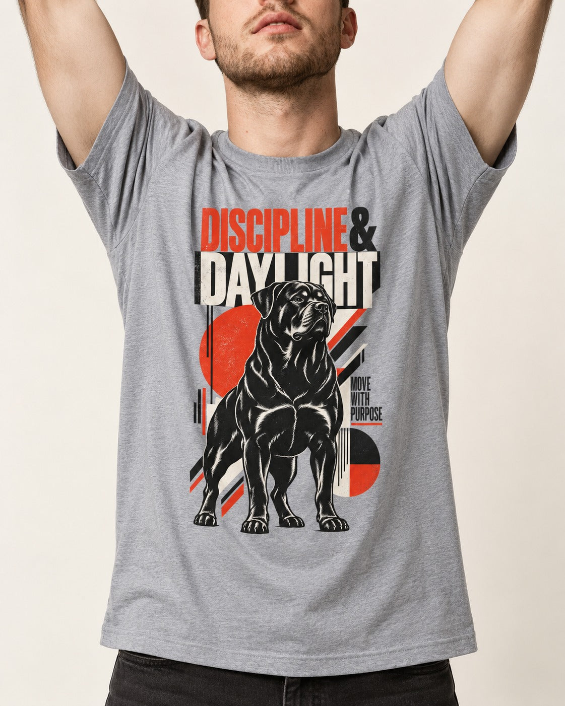 Discipline and Daylight Rottweiler Move With Purpose T-Shirt in Sport Grey, worn by a model, front view