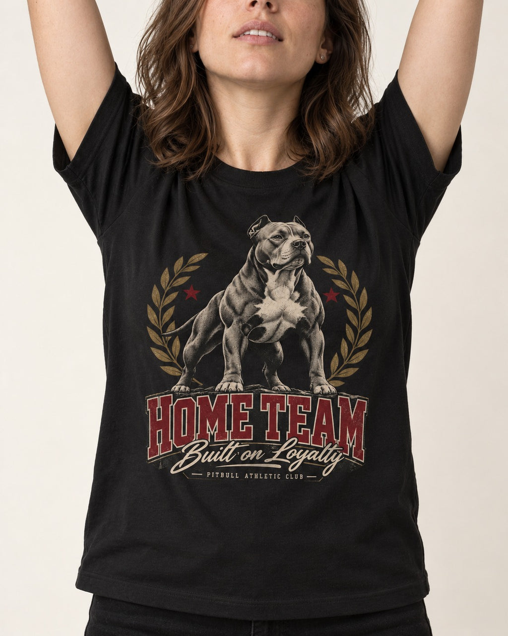 Pitbull Home Team Loyalty Crest Graphic T-Shirt in Black, worn by a model, front view