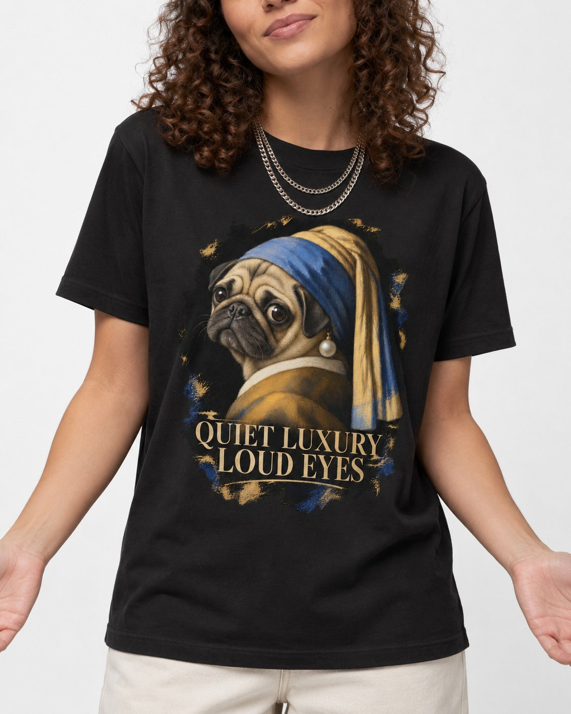 Pug Quiet Luxury Loud Eyes Pearl Portrait Graphic T-Shirt in Black, worn by a model, front view