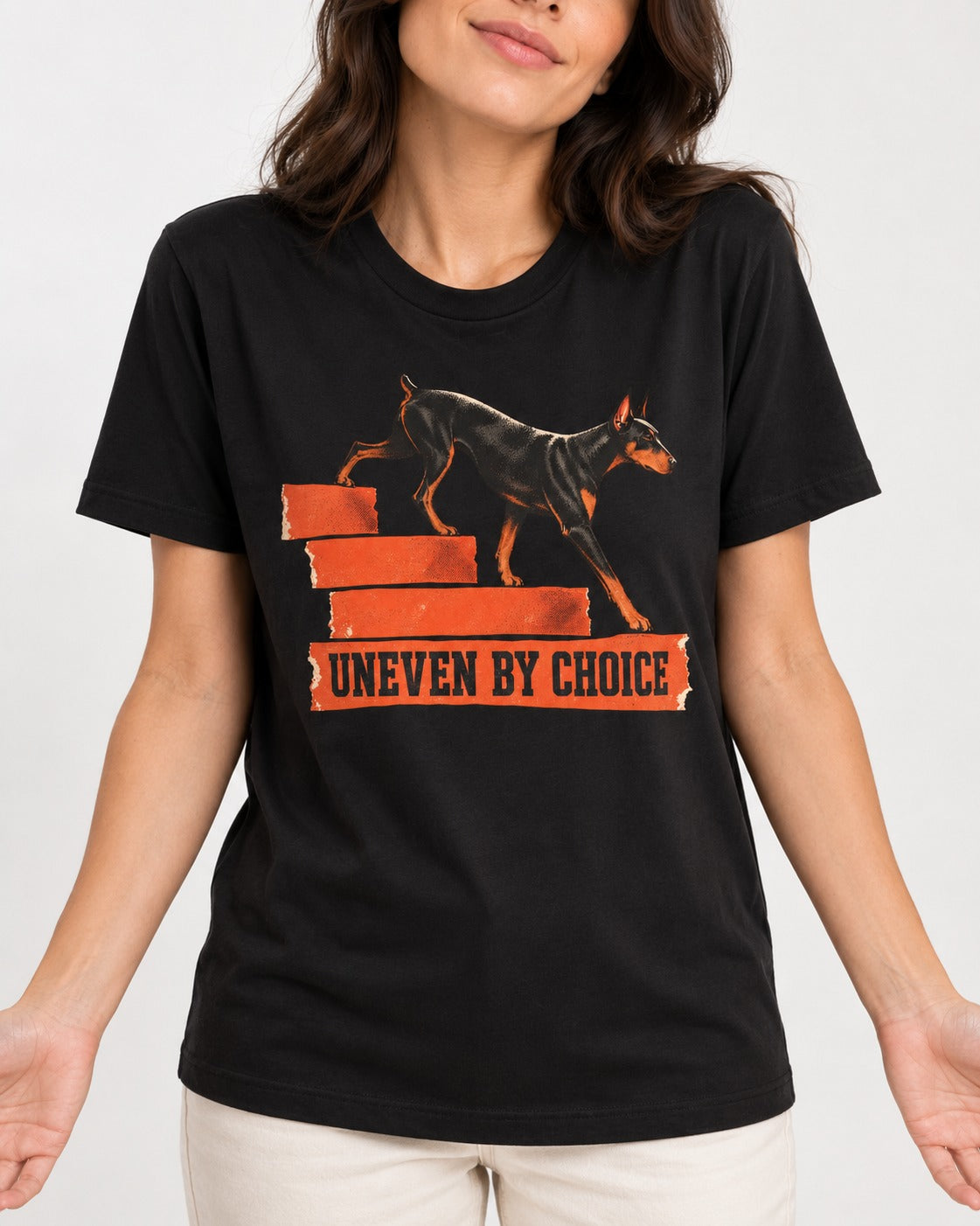 Doberman Uneven by Choice Stair Graphic T-Shirt in Black, worn by a model, front view