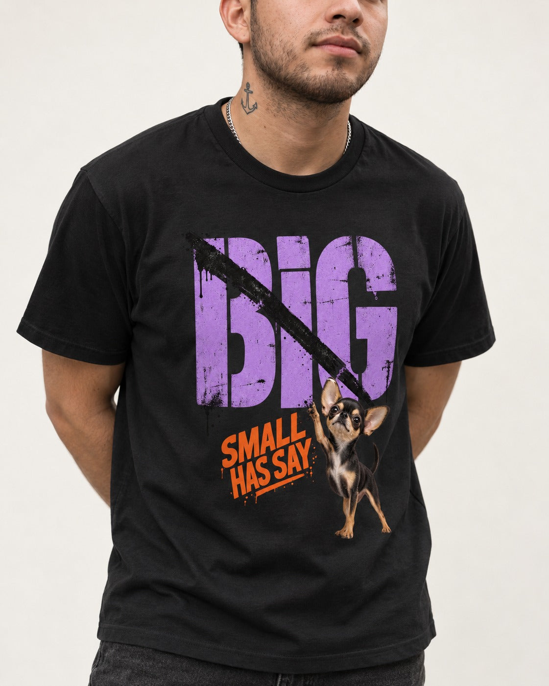 Chihuahua Big Small Has Say Diagonal Slash Graphic T-Shirt in Black, worn by a model, front view