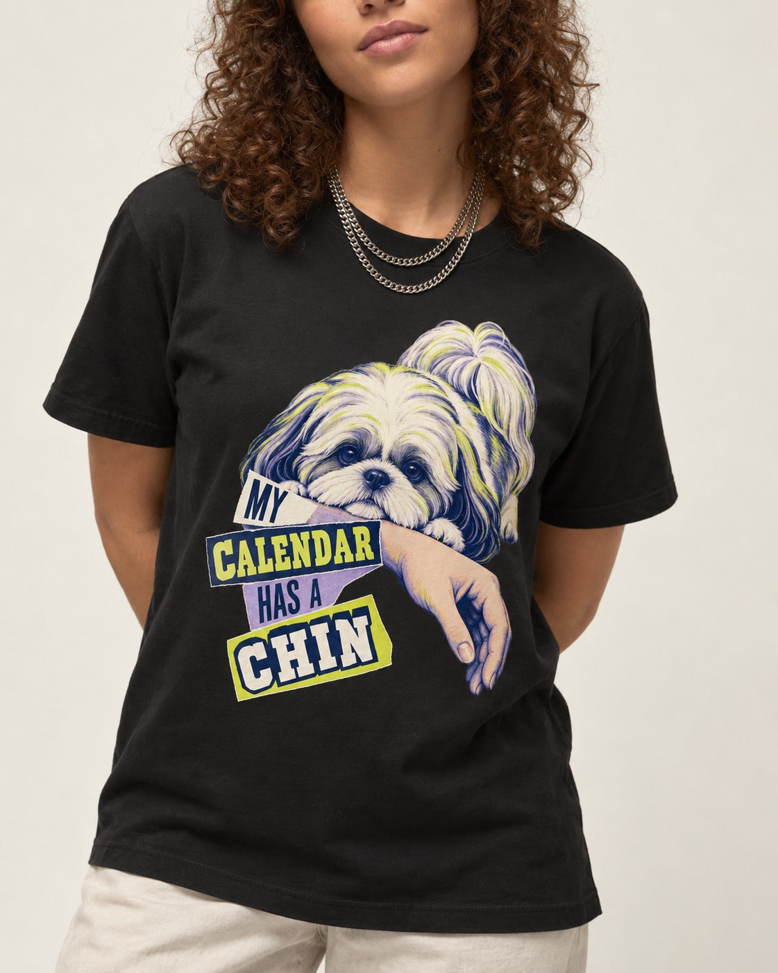 Shih Tzu My Calendar Has a Chin Arm Rest Graphic T-Shirt in Black, worn by a model, front view