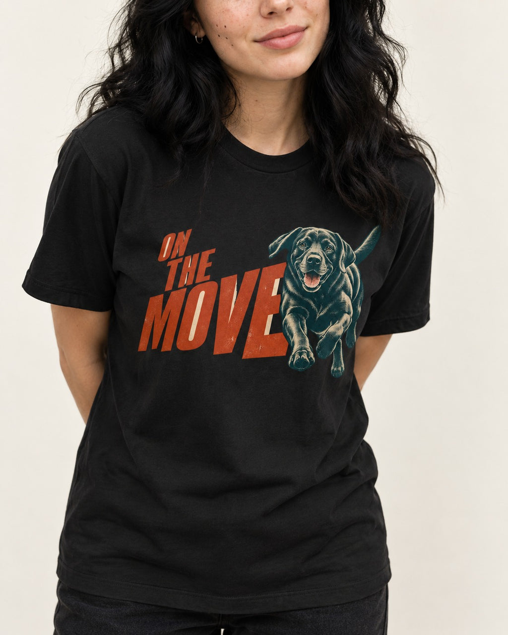 Labrador Retriever On the Move Running Graphic T-Shirt in Black, worn by a model, front view