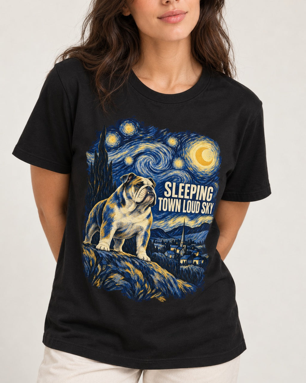 English Bulldog Sleeping Town Loud Sky Starry Night Graphic T-Shirt in Black, worn by a model, front view