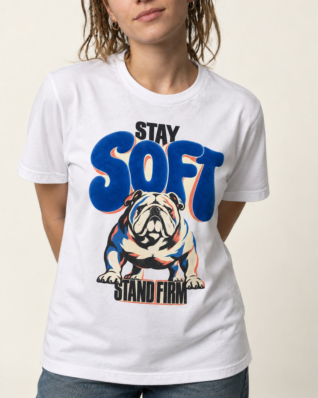 Stay Soft Stand Firm English Bulldog T-Shirt in White, worn by a model, front view
