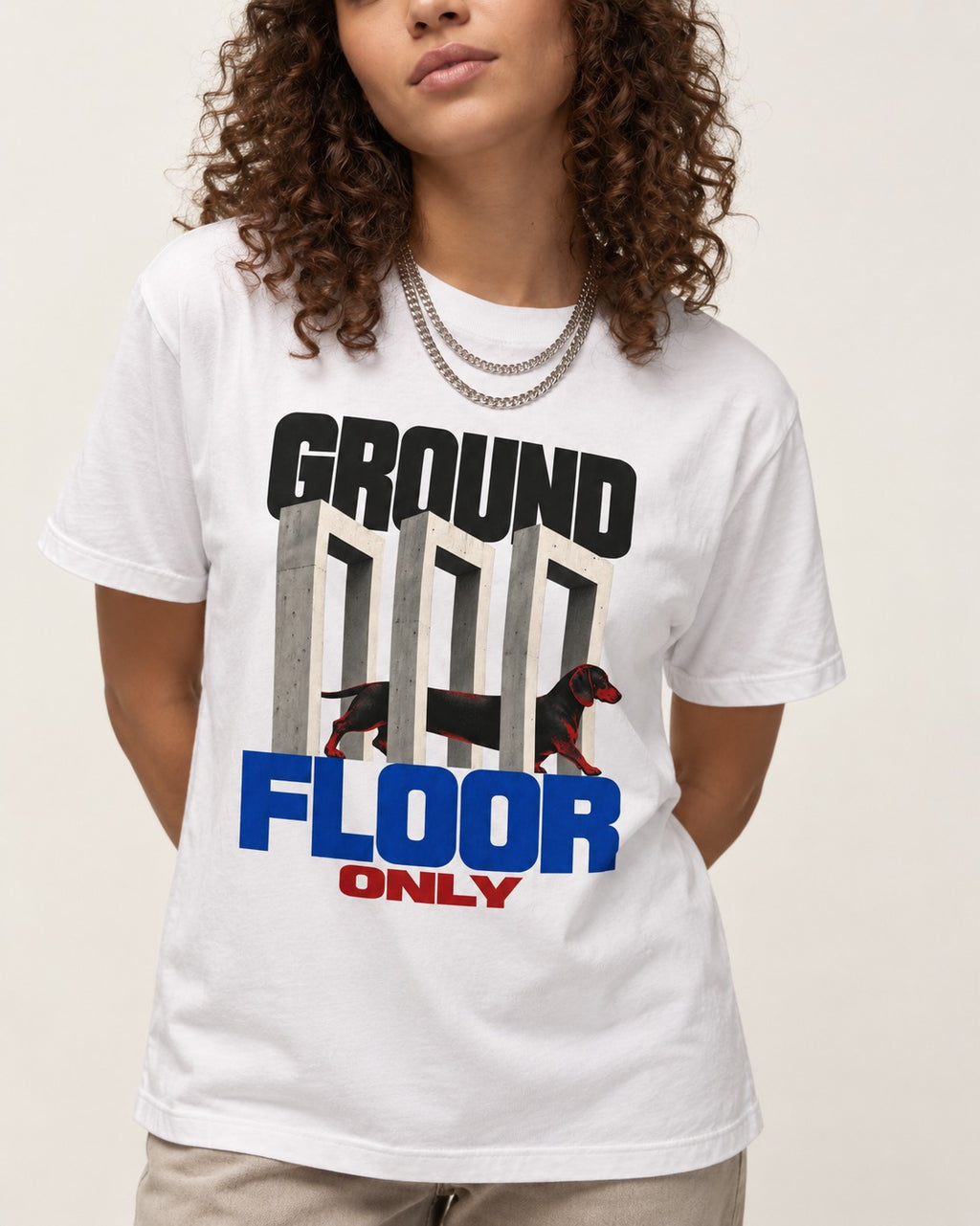 Ground Floor Only Dachshund T-Shirt in White, worn by a model, front view