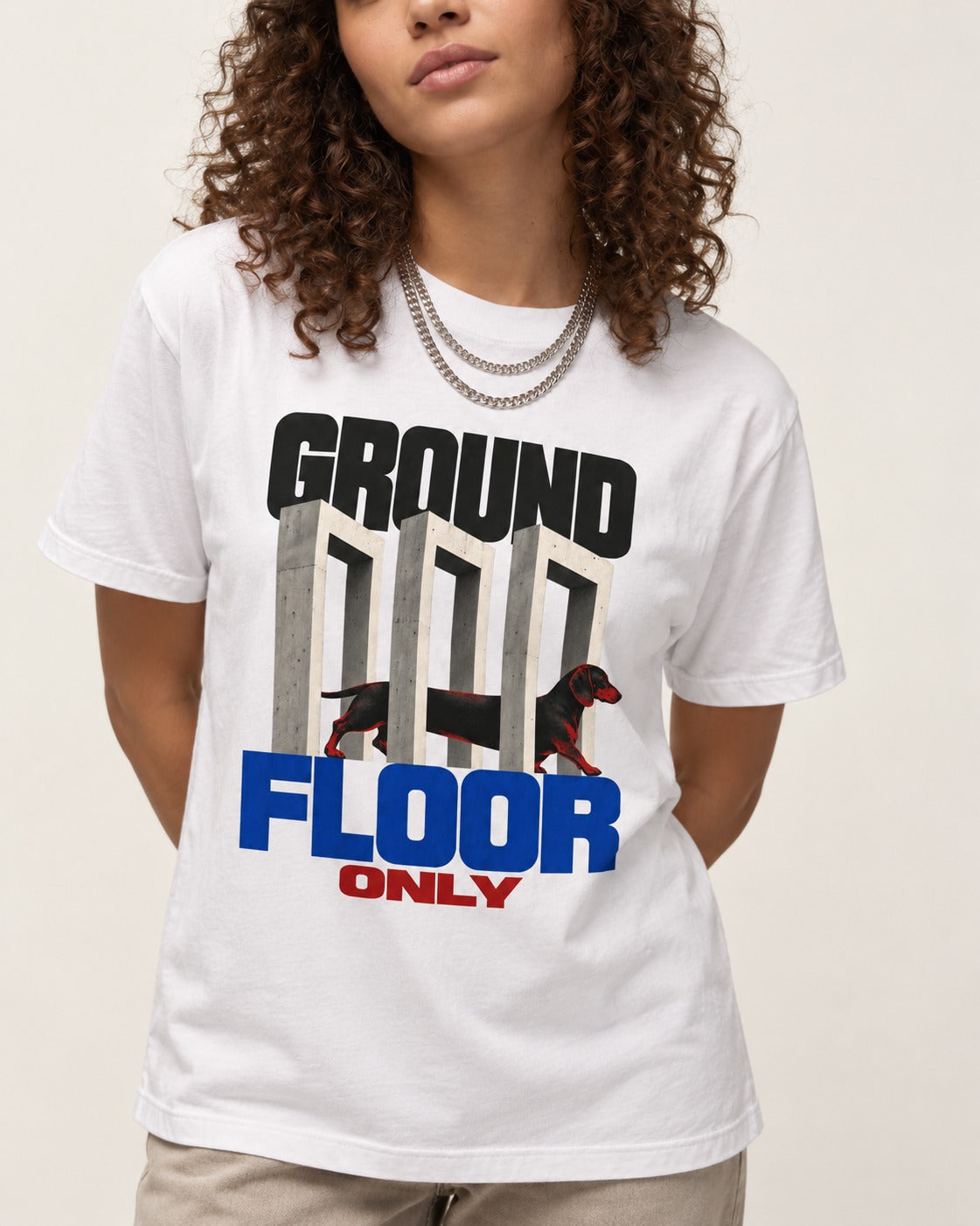 Ground Floor Only Dachshund T-Shirt in White, worn by a model, front view