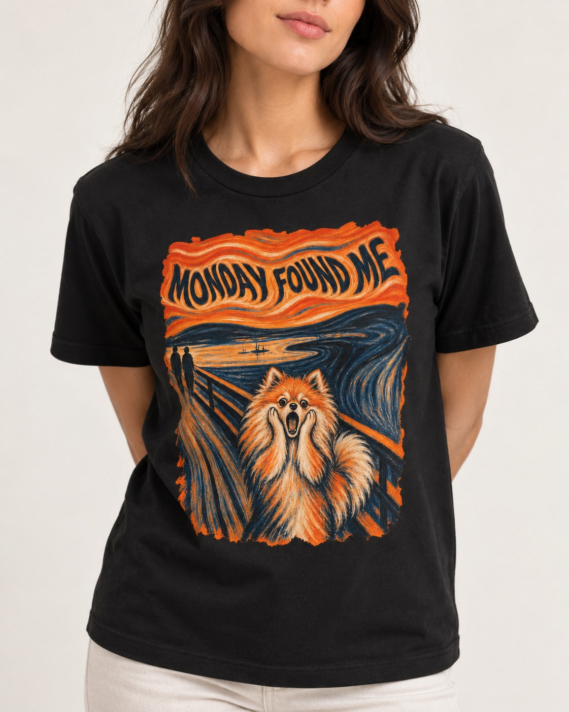 Pomeranian Monday Found Me Scream Parody Graphic T-Shirt in Black, worn by a model, front view