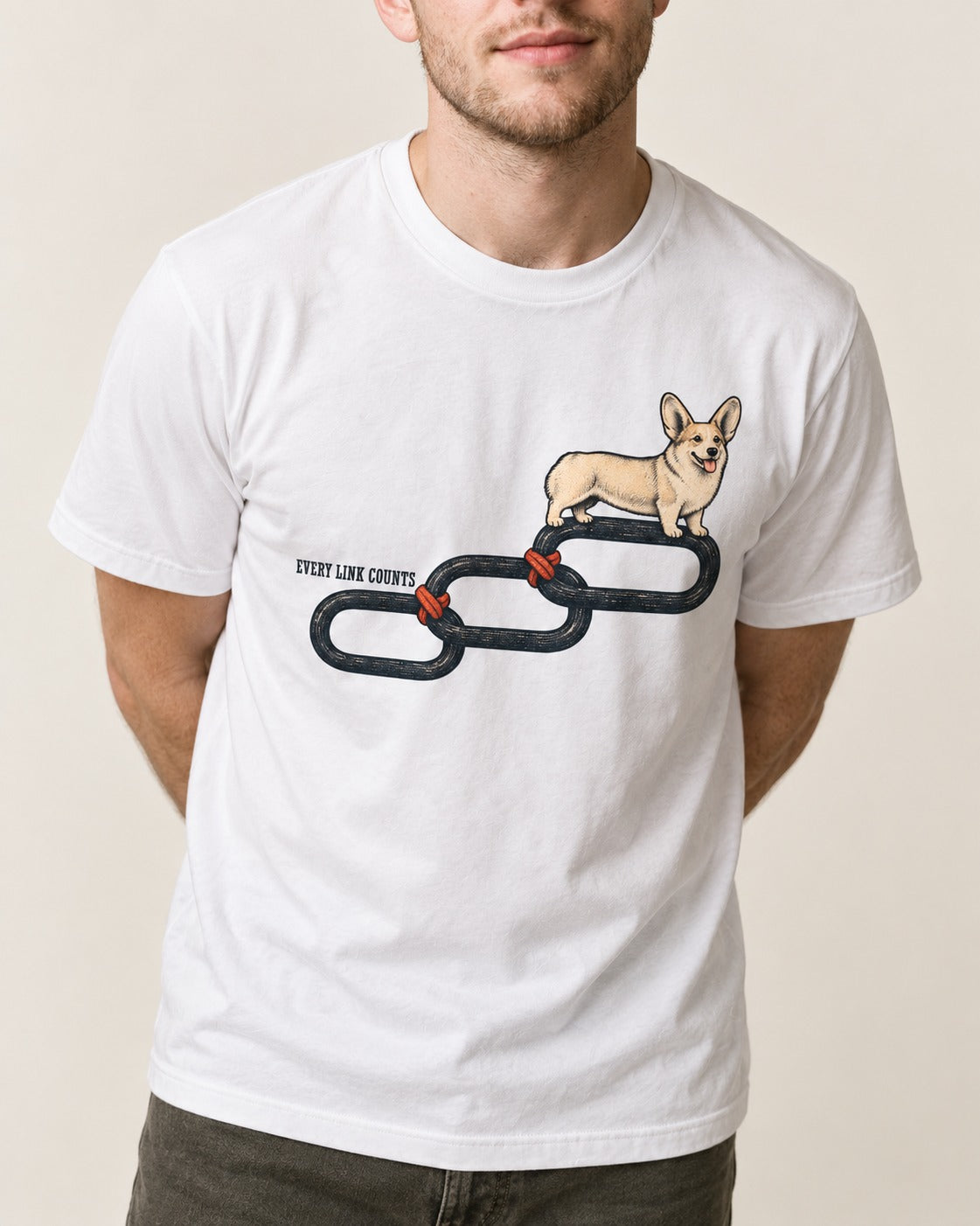 Every Corgi Link Counts T-Shirt in White, worn by a model, front view