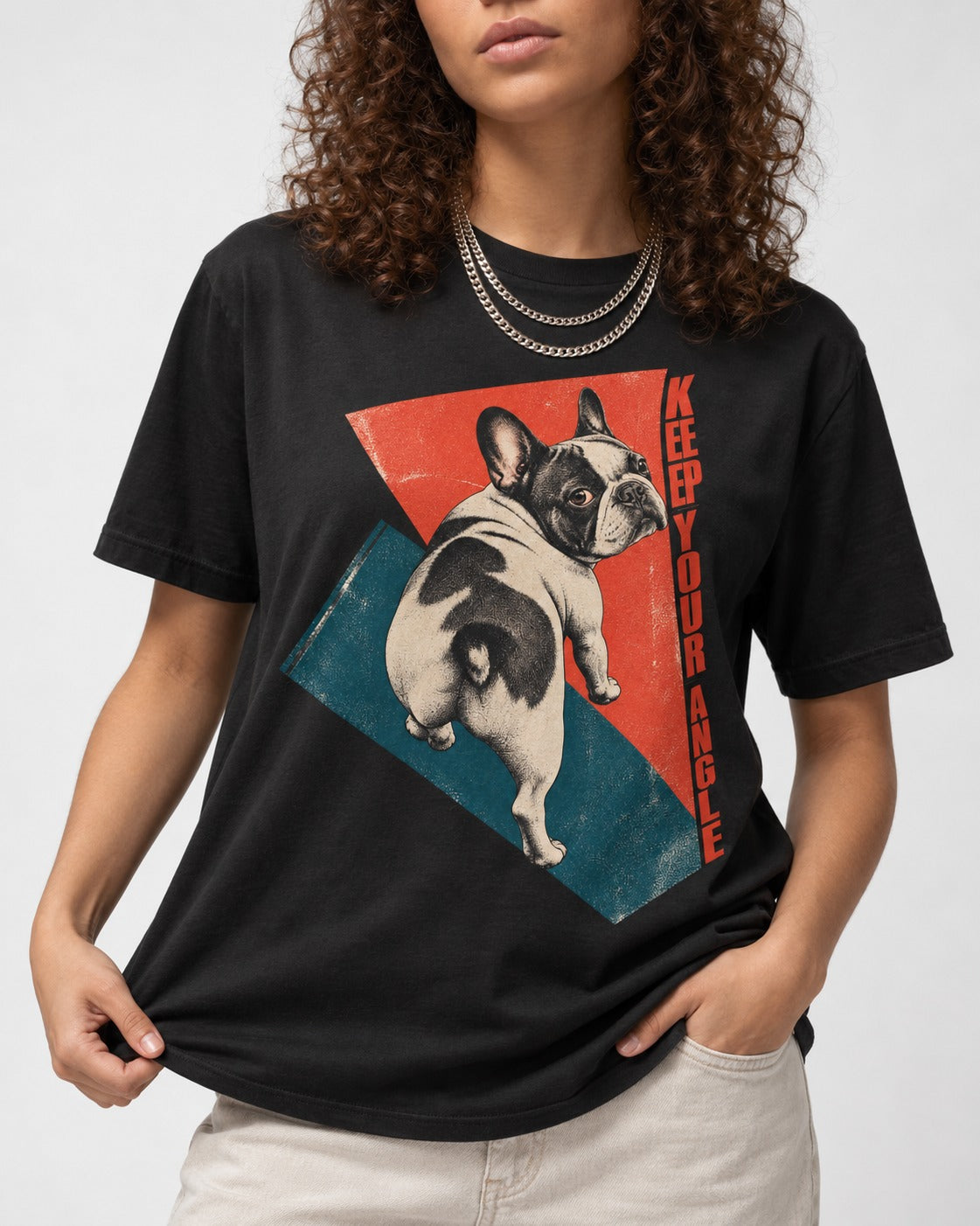 Frenchie Keep Your Angle Geometric Graphic T-Shirt in Black, worn by a model, front view