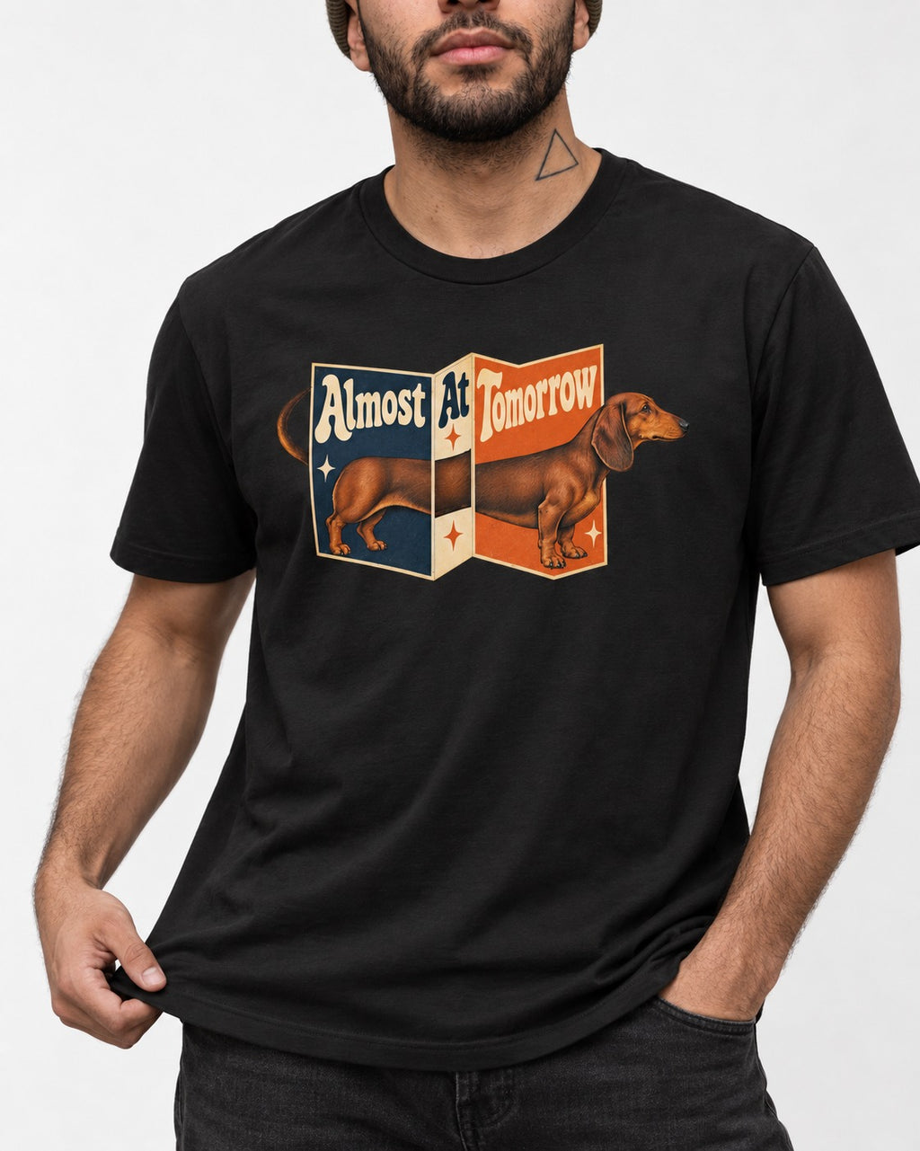 Dachshund Almost At Tomorrow Folding Screen Graphic T-Shirt in Black, worn by a model, front view