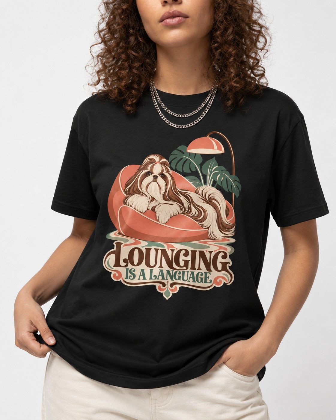 Shih Tzu Lounging Is a Language Retro Lounge Graphic T-Shirt in Black, worn by a model, front view