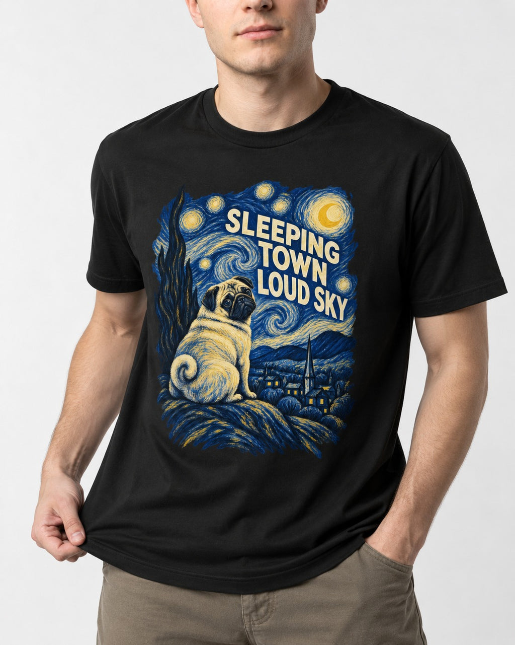 Pug Sleeping Town Loud Sky Starry Night Graphic T-Shirt in Black, worn by a model, front view