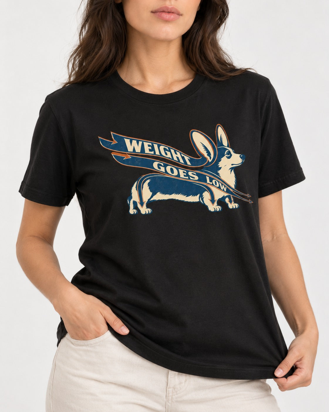 Corgi Weight Goes Low Ribbon Arrow Graphic T-Shirt in Black, worn by a model, front view