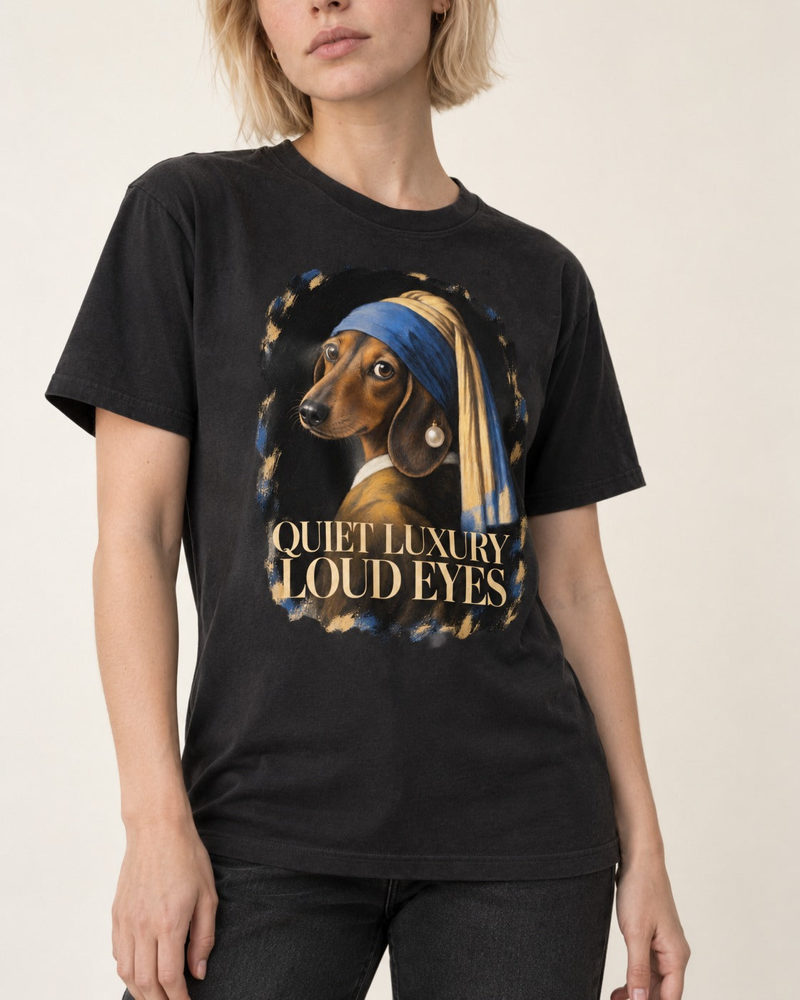 Dachshund Quiet Luxury Loud Eyes Pearl Portrait Graphic T-Shirt in Black, worn by a model, front view