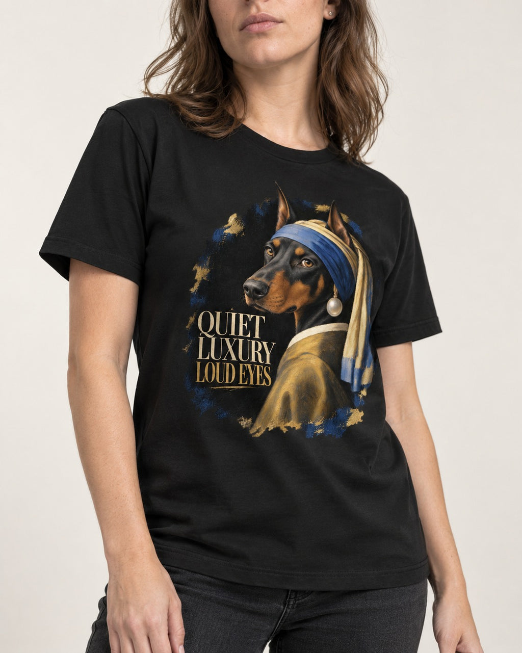 Doberman Quiet Luxury Loud Eyes Pearl Portrait Graphic T-Shirt in Black, worn by a model, front view