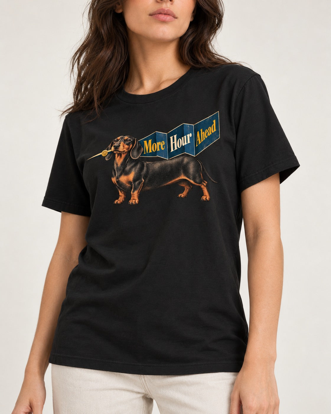 Dachshund More Hour Ahead Foldout Banner Graphic T-Shirt in Black, worn by a model, front view