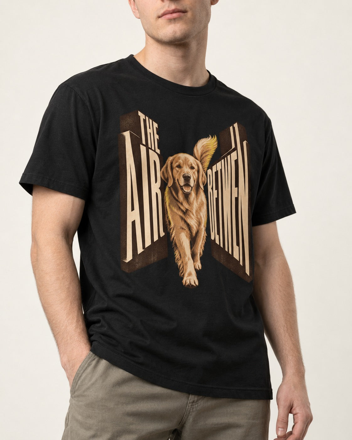 The Air Between Dimensional Golden Retriever Graphic T-Shirt in Black, worn by a model, front view