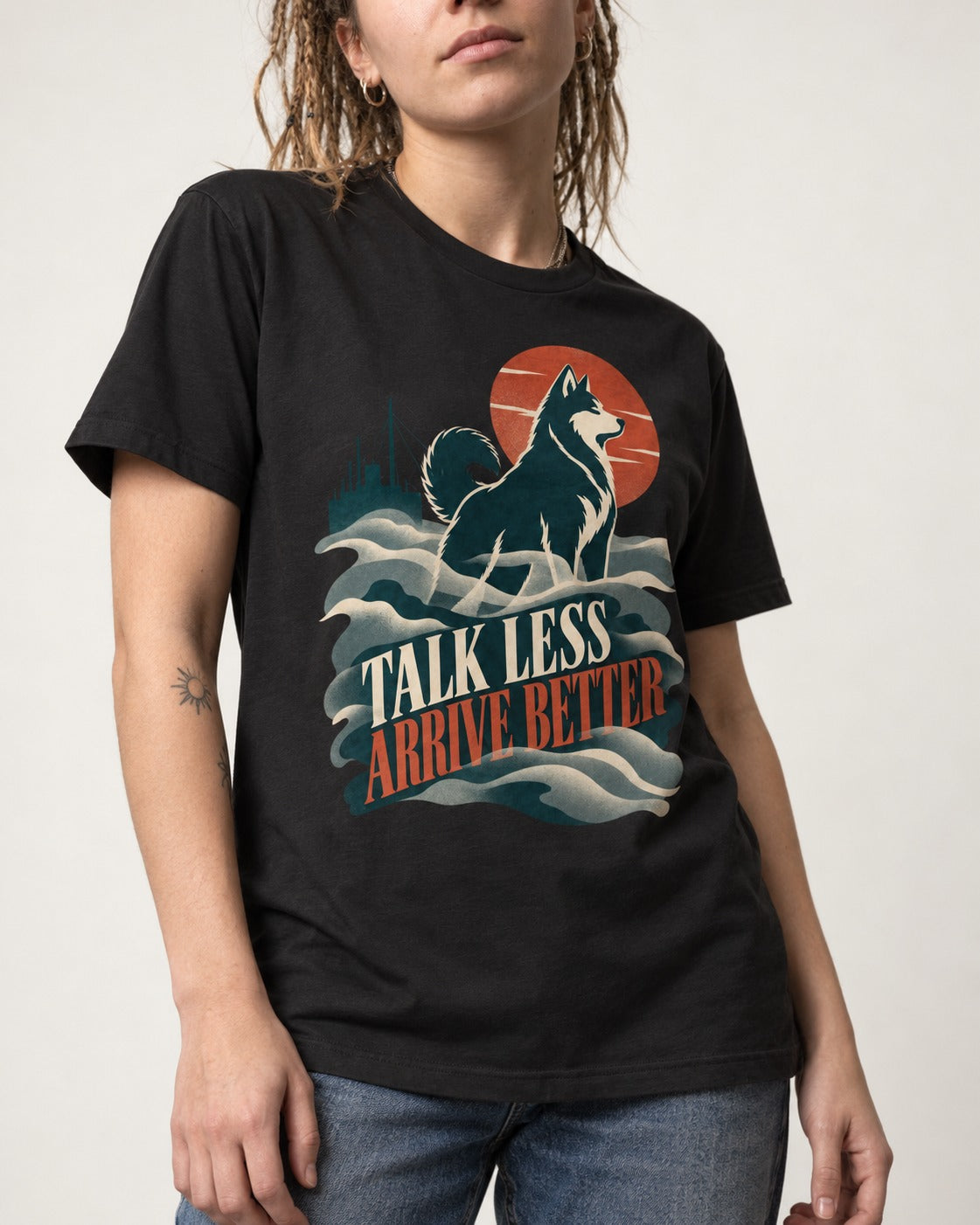 Husky Talk Less Arrive Better Harbor Wave Graphic T-Shirt in Black, worn by a model, front view