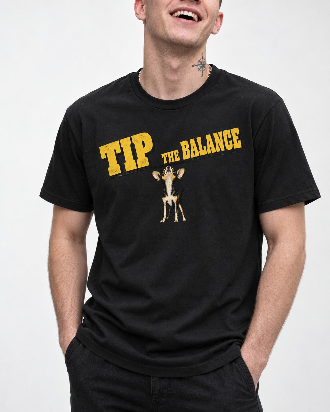 Chihuahua Tip the Balance Beam Graphic T-Shirt in Black, worn by a model, front view