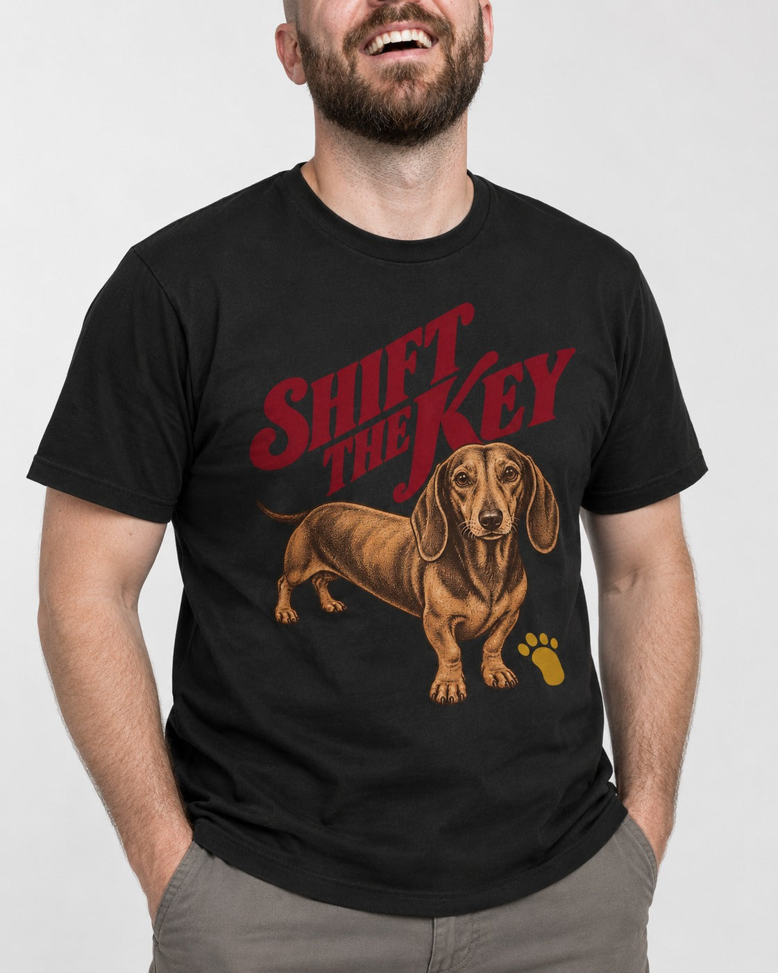 Dachshund Shift The Key Pawprint Graphic T-Shirt in Black, worn by a model, front view