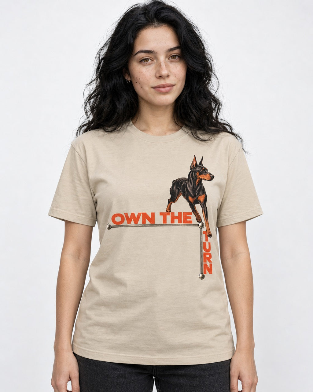 Own the Turn Doberman T-Shirt in Sand, worn by a model