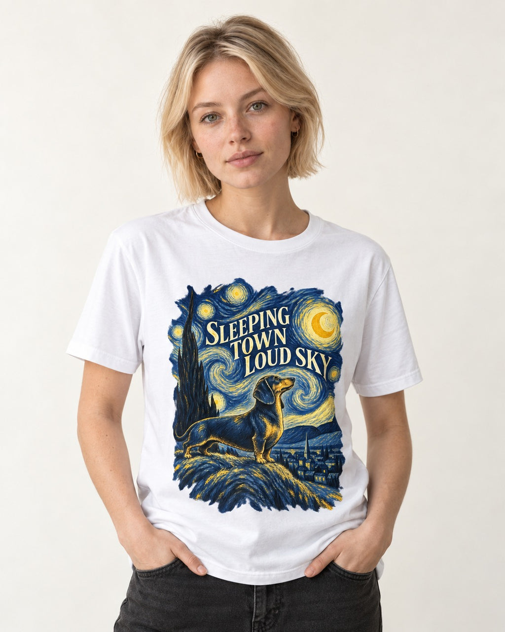 Dachshund Sleeping Town Loud Sky Starry Night Graphic T-Shirt in White, worn by a model
