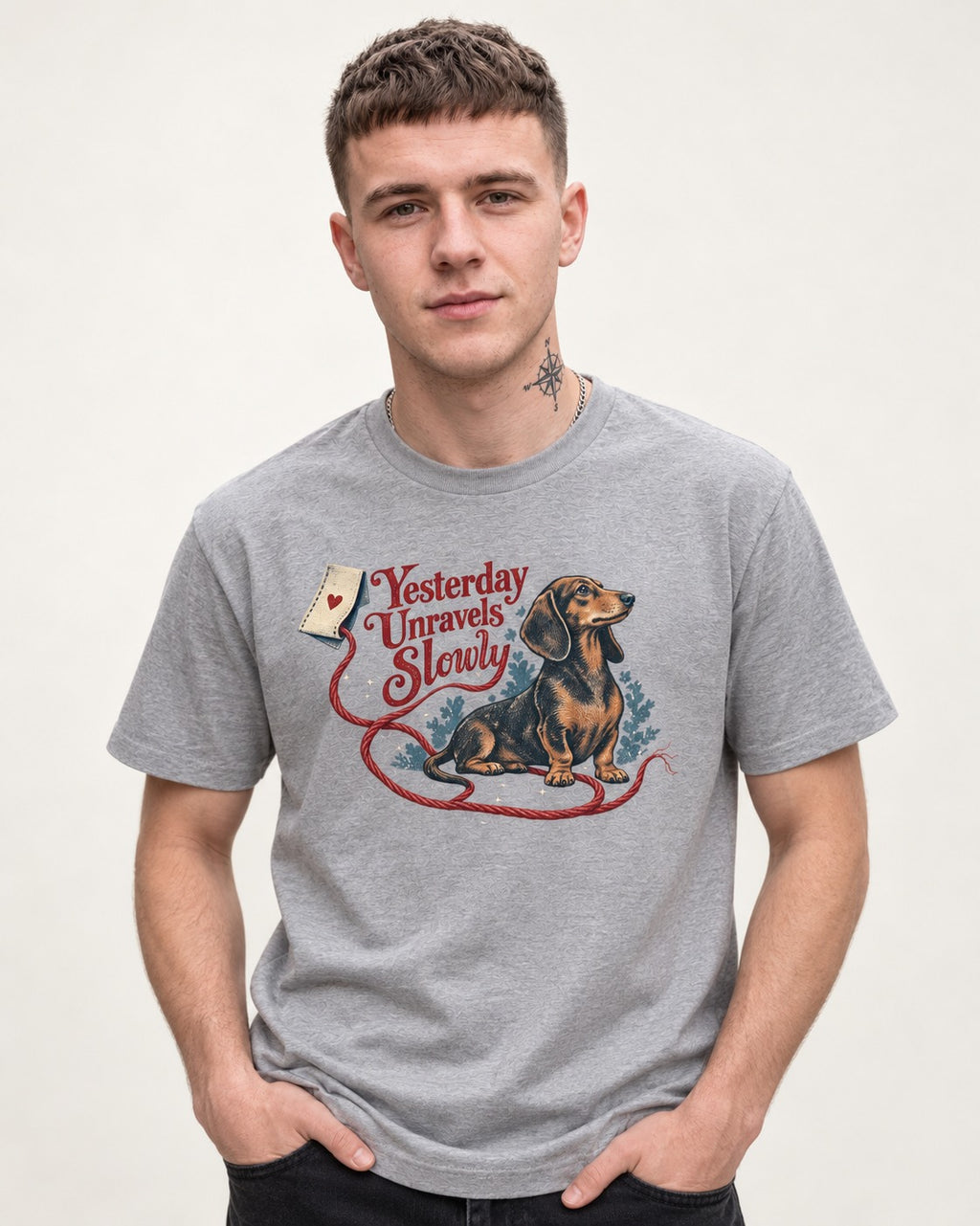 Yesterday Unravels Slowly with Dachshund T-Shirt in Sport Grey, worn by a model