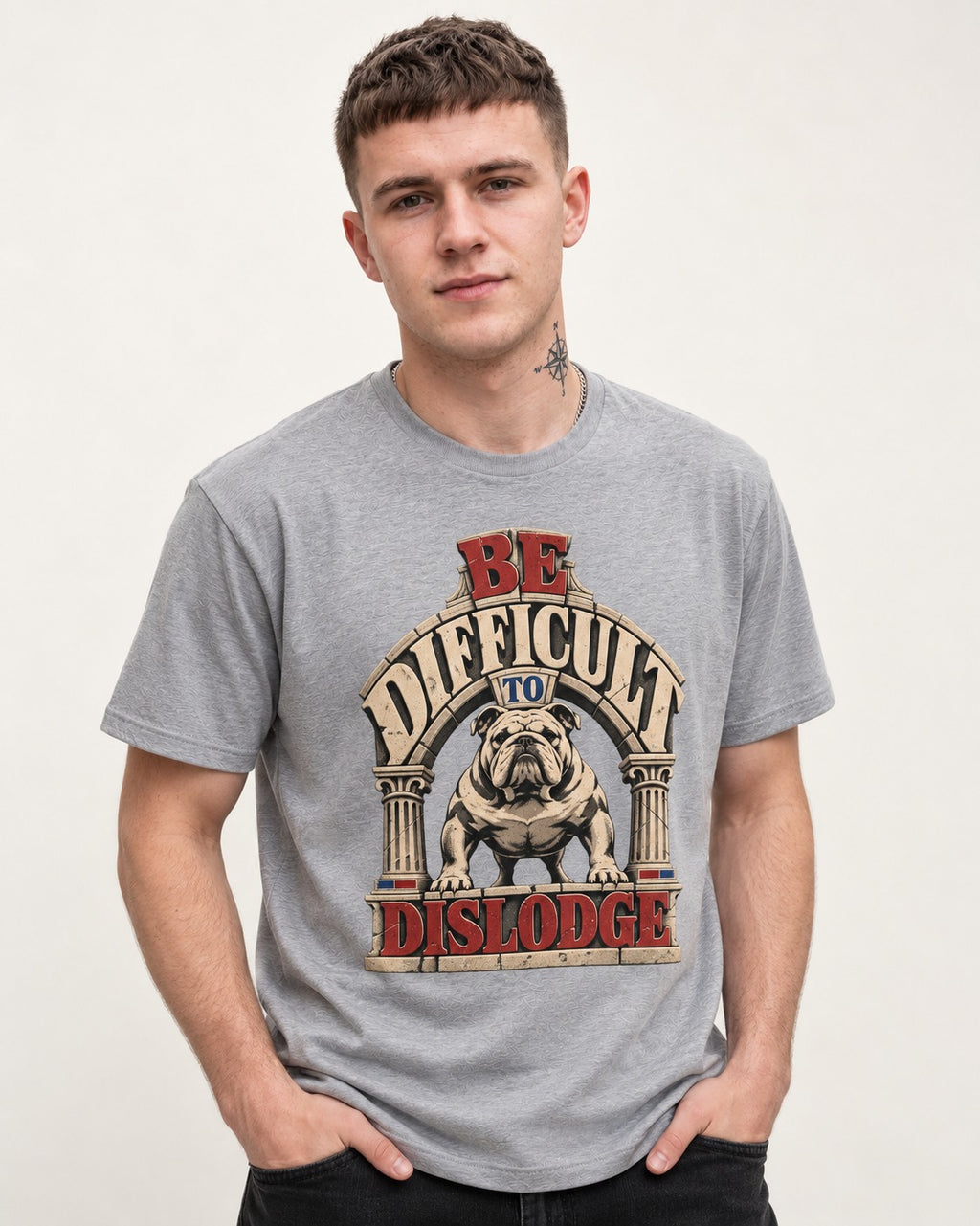 English Bulldog Be Difficult to Dislodge Stone Arch Graphic T-Shirt in Sport Grey, worn by a model