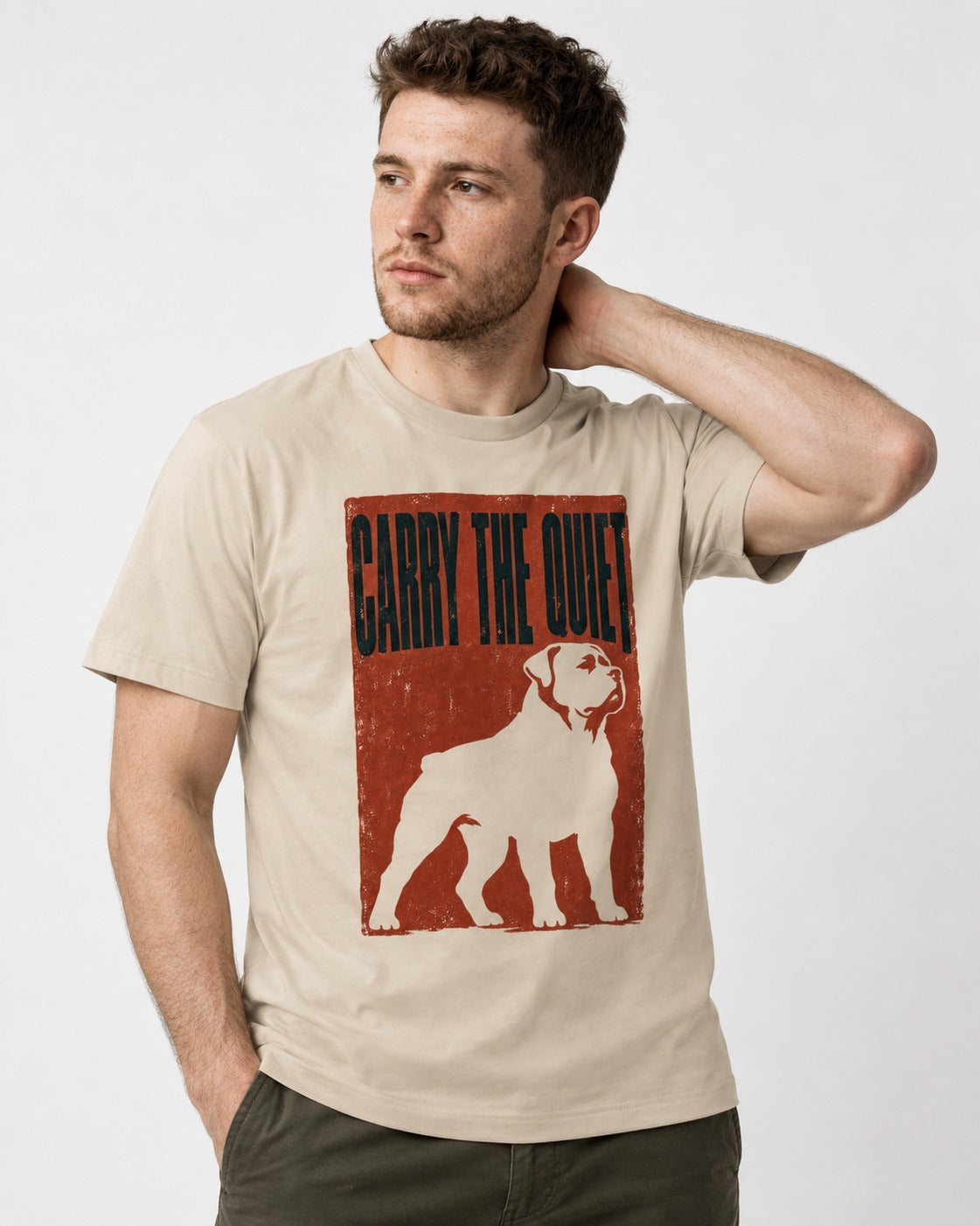 Rottweiler Carry the Quiet T-Shirt in Sand, worn by a model
