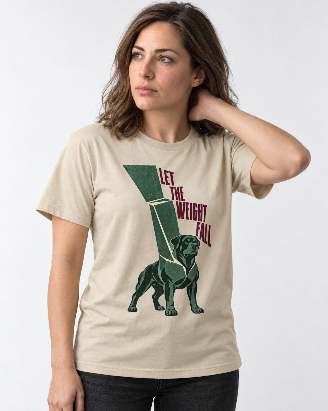 Let the Weight Fall Rottweiler T-Shirt in Sand, worn by a model