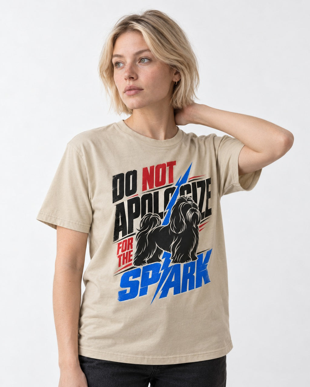 Never Apologize for Shih Tzu Spark T-Shirt in Sand, worn by a model