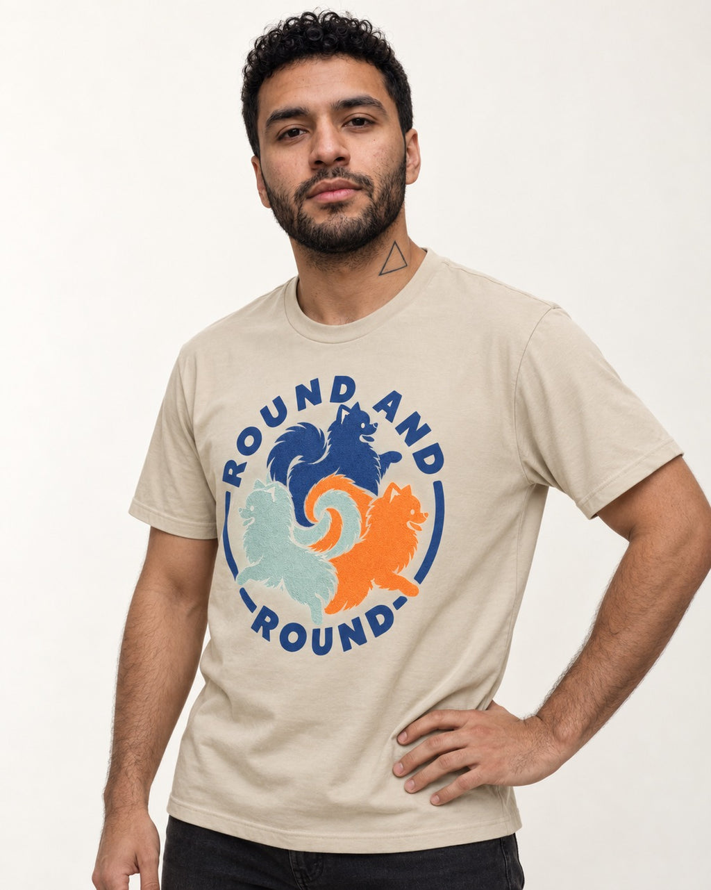 Pomeranian Round and Round T-Shirt in Sand, worn by a model