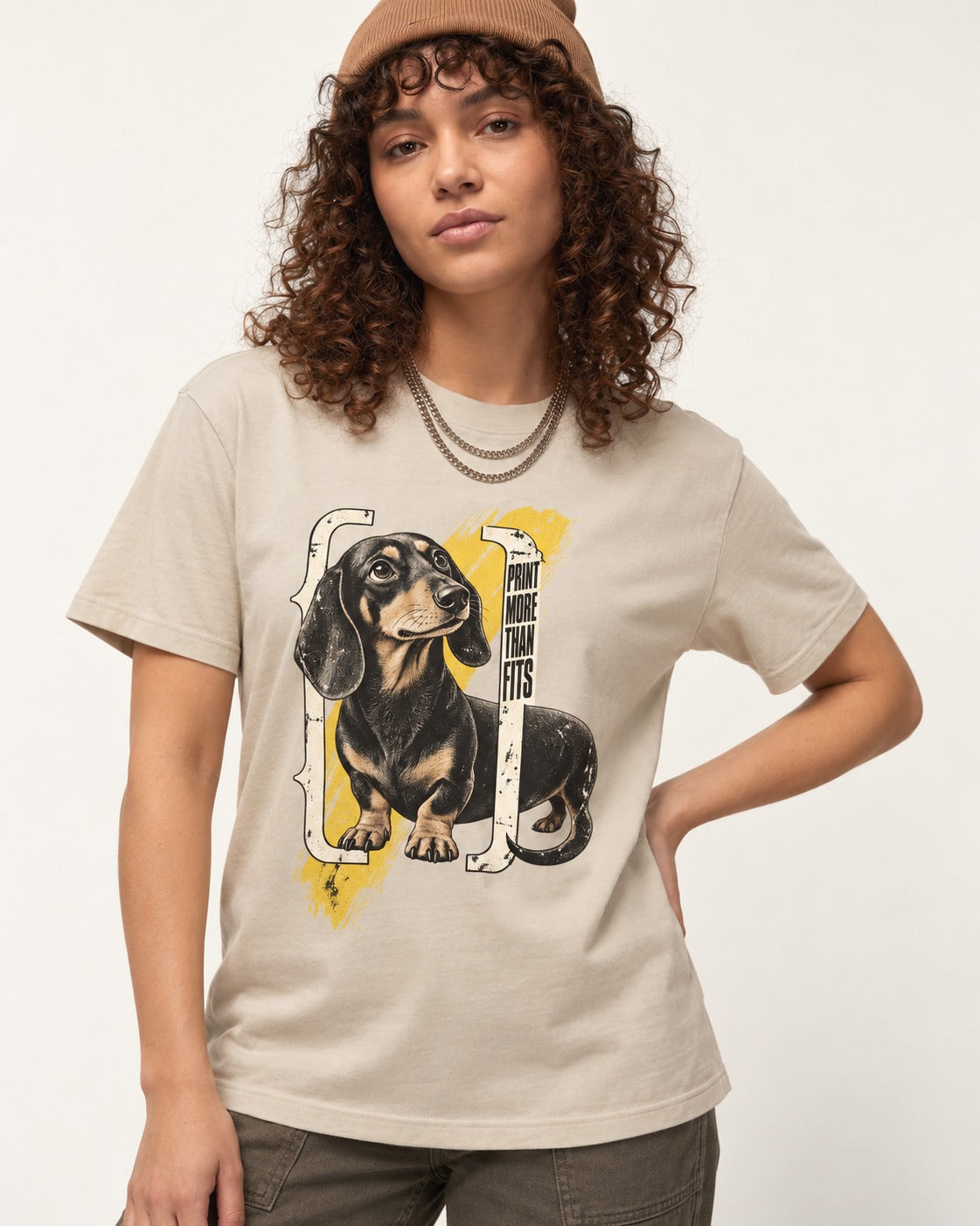 Dachshund More Than Fits T-Shirt in Sand, worn by a model