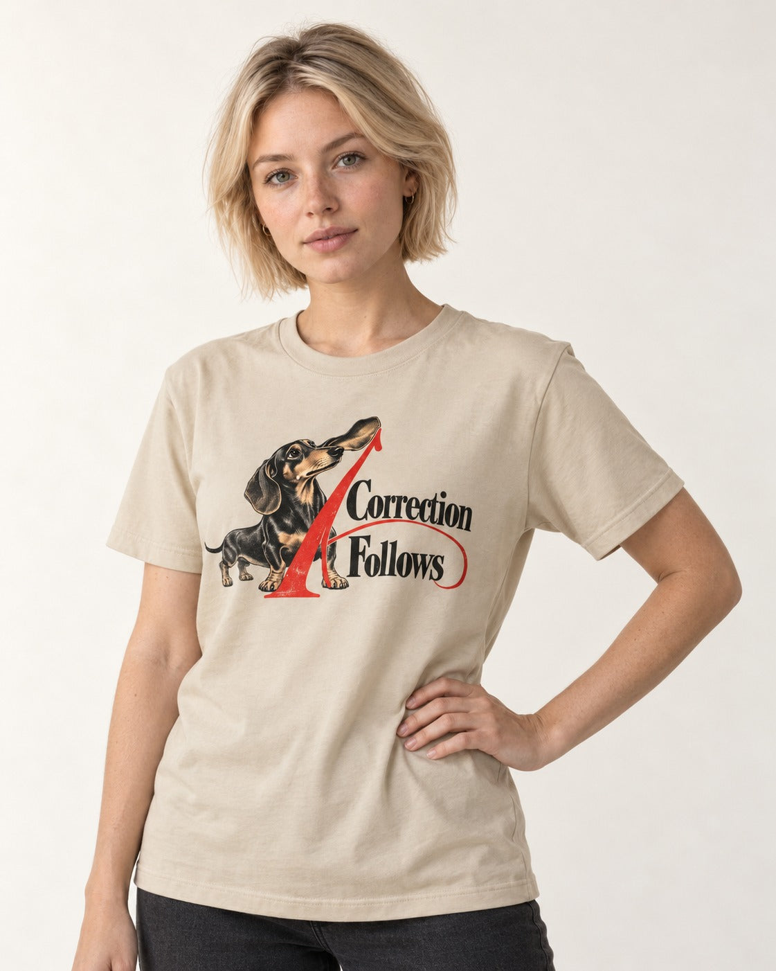 A Dachshund Correction Follows T-Shirt in Sand, worn by a model