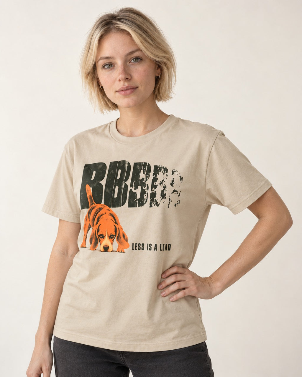 Less Is a Lead Beagle T-Shirt in Sand, worn by a model