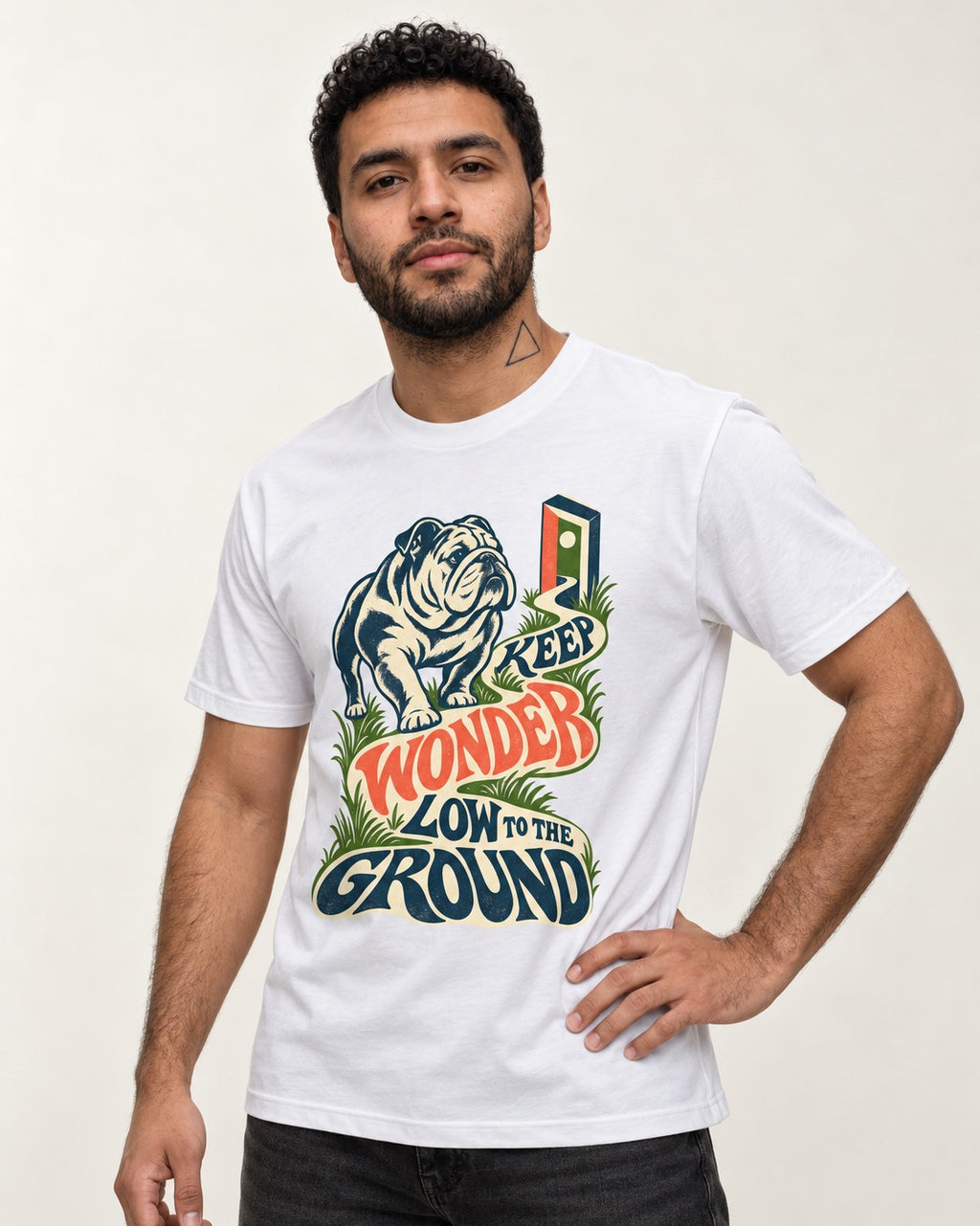 Keep Wonder Low to the Ground English Bulldog Graphic T-Shirt in White, worn by a model