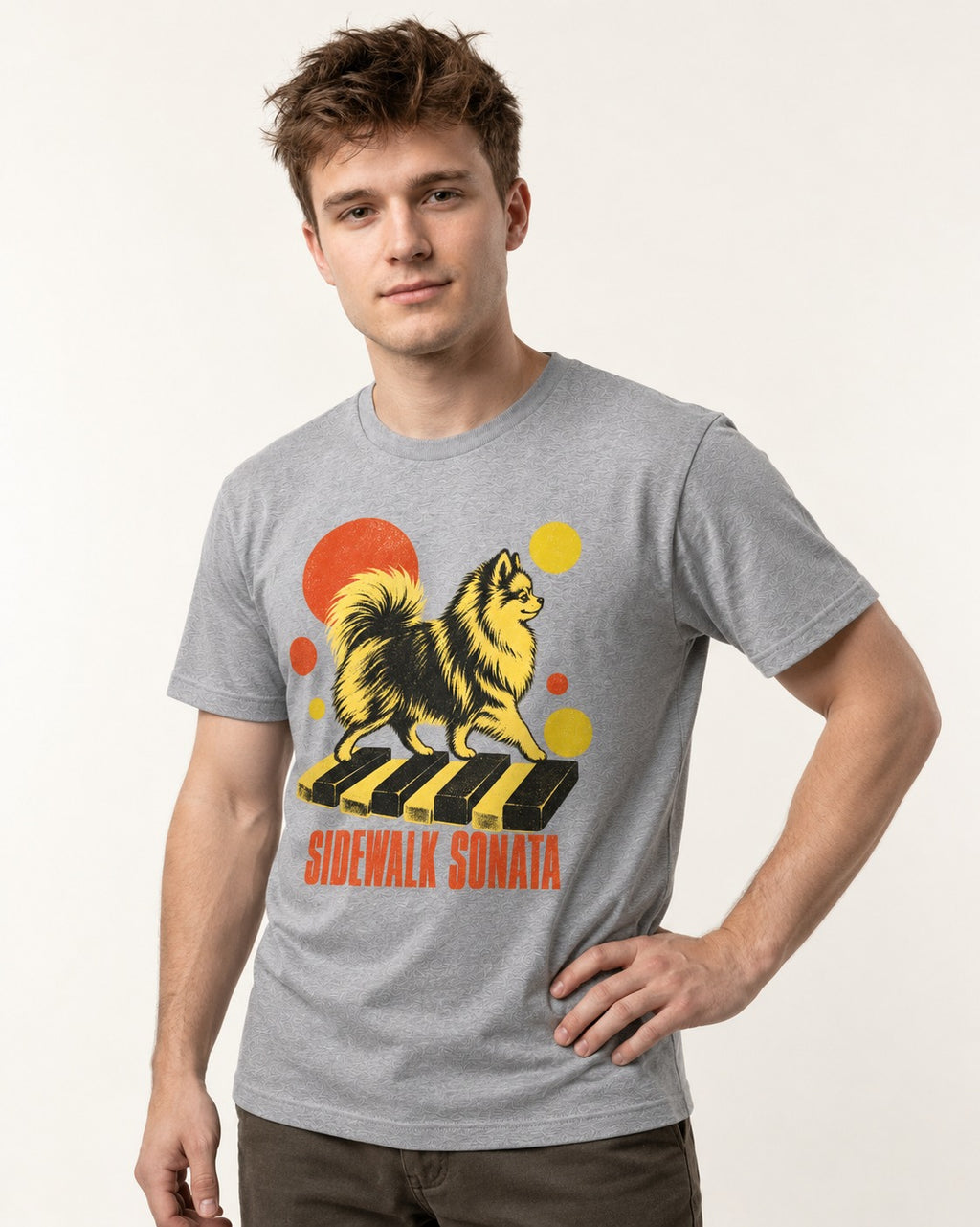Pomeranian Sidewalk Sonata Piano Graphic T-Shirt in Sport Grey, worn by a model