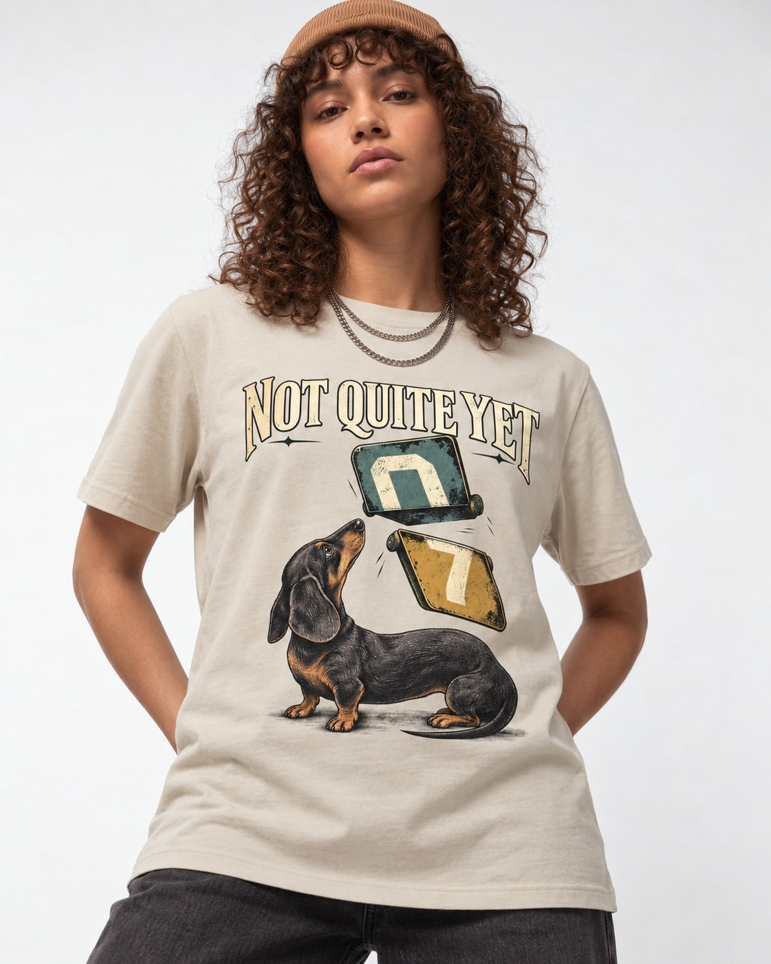 Not Quite Yet Dachshund T-Shirt in Sand, worn by a model
