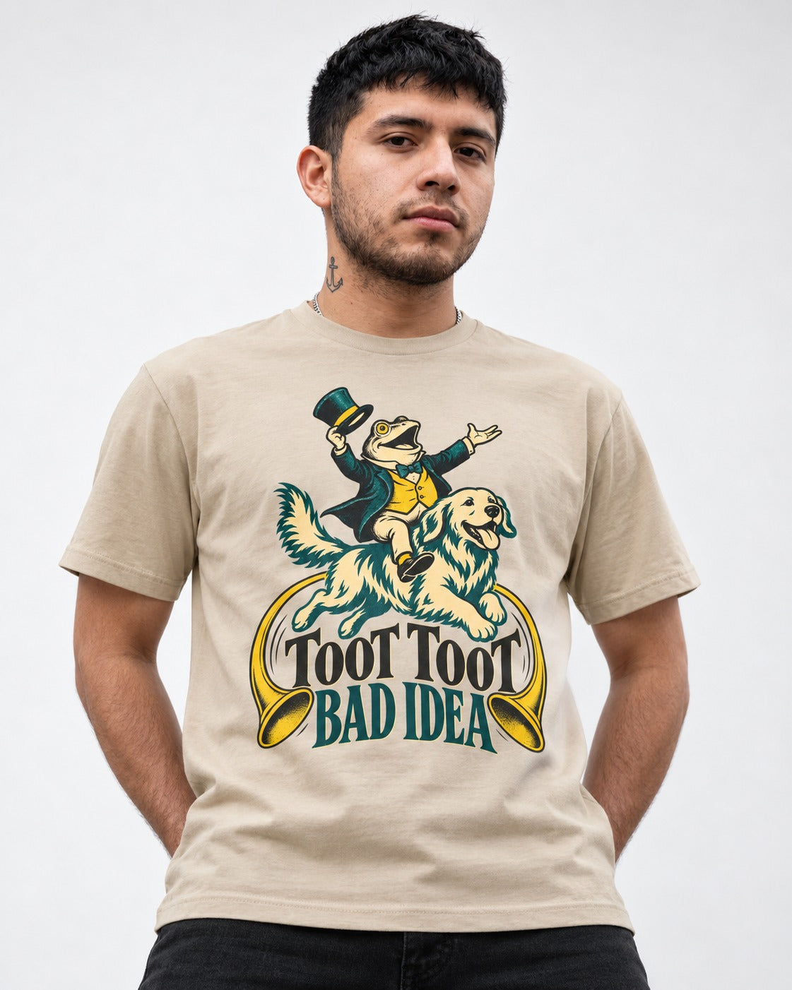 Golden Retriever Toot Toot Bad Idea T-Shirt in Sand, worn by a model