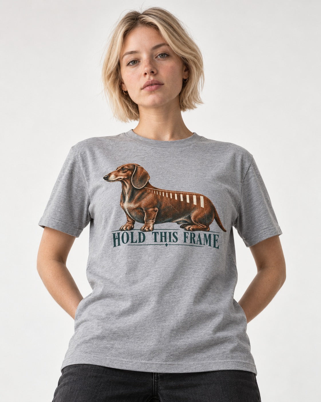 Dachshund Hold This Frame T-Shirt in Sport Grey, worn by a model