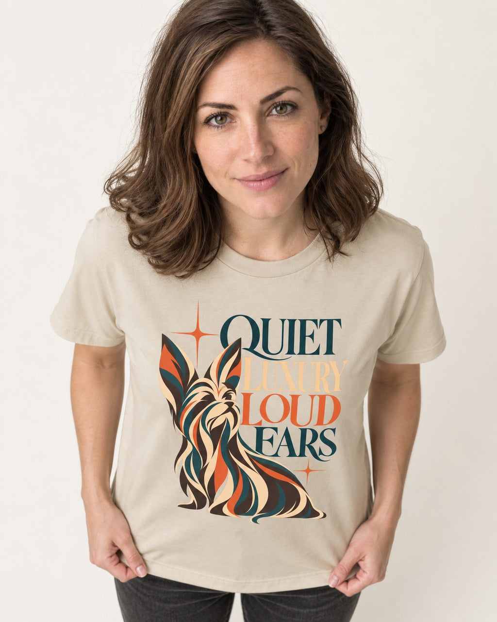 Quiet Luxury Loud Ears Yorkshire Terrier T-Shirt in Sand, worn by a model