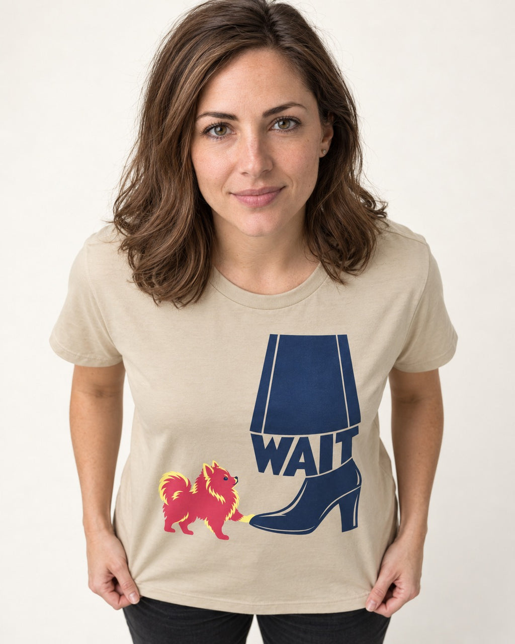 Pomeranian Says Wait T-Shirt in Sand, worn by a model