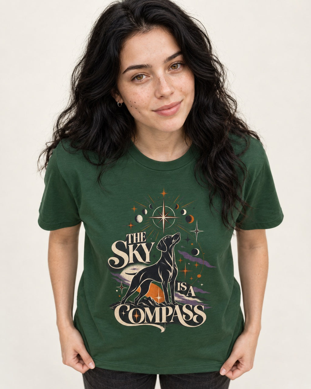 The Sky Is a Compass Celestial German Shorthaired Pointer Graphic T-Shirt in Forest Green, worn by a model