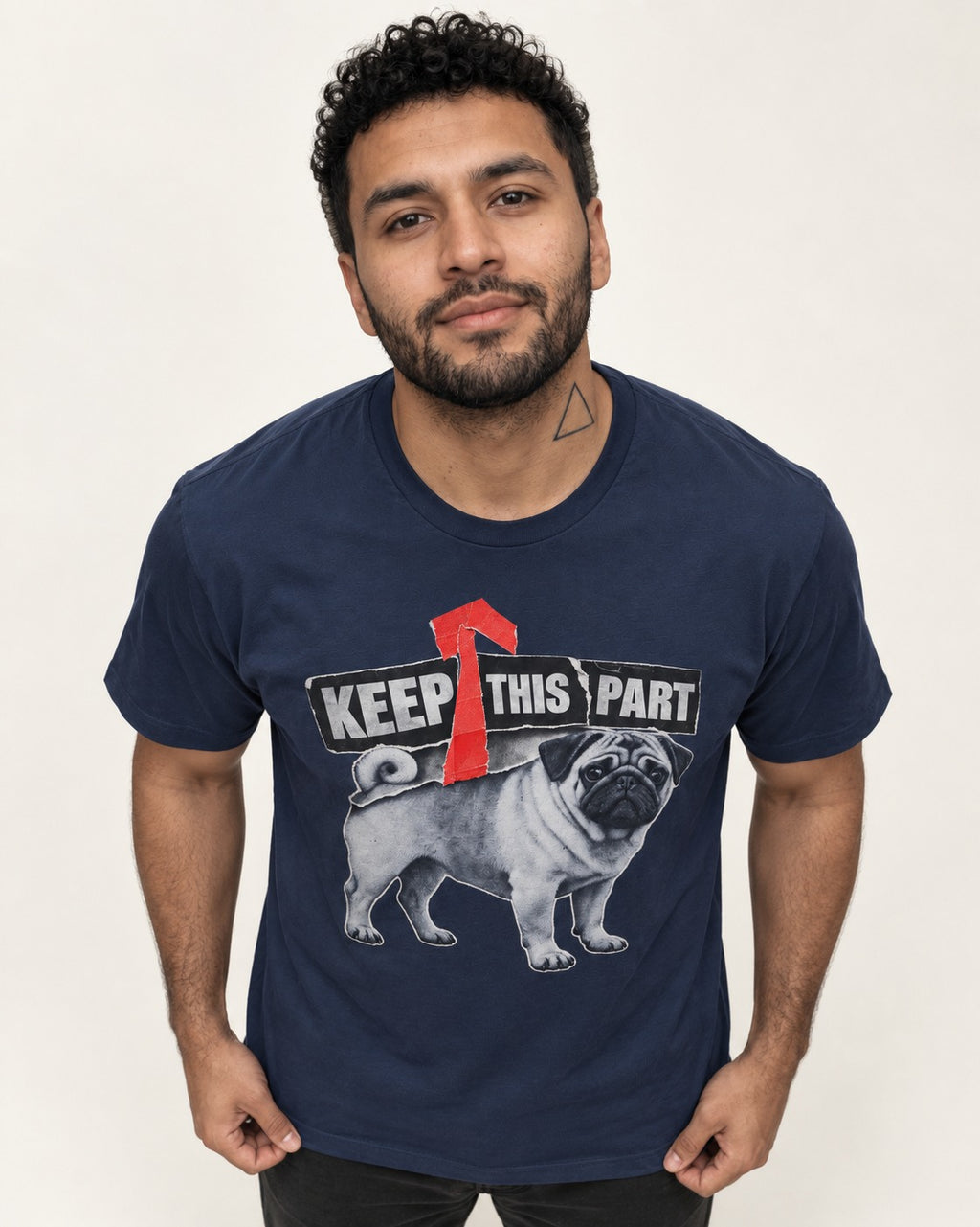Pug Keep This Part Tape Arrow Graphic T-Shirt in Navy, worn by a model
